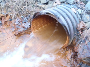 The Askam AMD Borehole spewing mine drainage into the Nanticoke Creek along Dundee Road just east of Loomis Park in Hanover Township