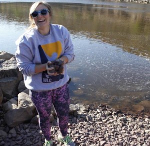 EPCAMR's first Community Relations Outreach Intern, Gabby Zawacki, collecting rock samples down by the Susquehanna River.